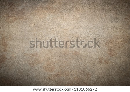 Dark brown stone or slate wall. Grunge background
