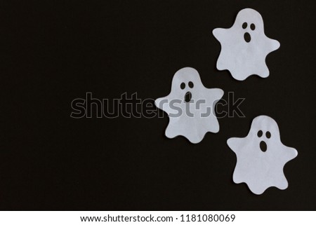 Elements of halloween decoration, ghots  on black background. Holidays, decoration and party concept. Top View. Copy Space