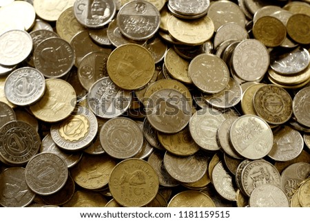 Photo of a bunch of coins on a table