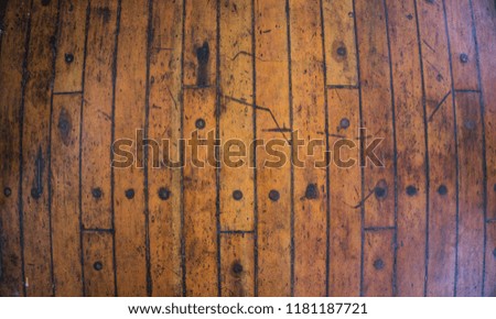 wooden texture background with brown yellow color as floor of the ship deck in central java indonesia
