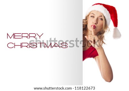 Christmas girl in santa hat holding banner. Isolated.