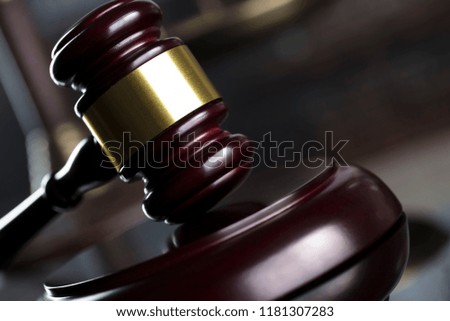 Law concept. Old library, scales, statue of justice, clock, hourglass. Bokeh background. Place for typography.
