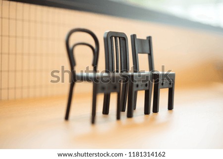 Three wooden chairs