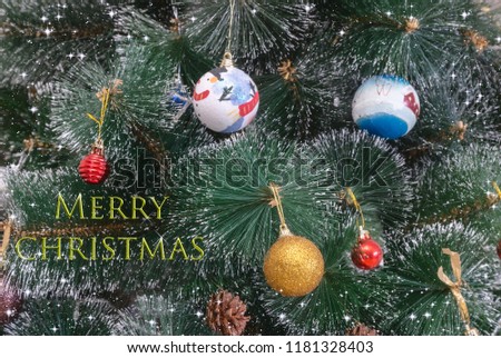 Christmas and New Year greeting card with a picture of a decorated Christmas tree and a greeting inscription.