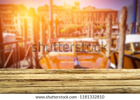 Desk of free space and Venice background. 