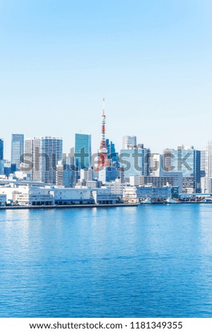 Asia Business concept for real estate and corporate construction - panoramic city skyline aerial view of tokyo tower under blue sky in odaiba, Tokyo, Japan