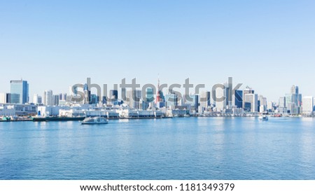 Asia Business concept for real estate and corporate construction - panoramic city skyline aerial view of tokyo tower under blue sky in odaiba, Tokyo, Japan
