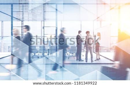 Business people walking and talking in a modern company office. Geometric pattern and skyscrapers foreground. Toned image double exposure mock up blurred Royalty-Free Stock Photo #1181349922