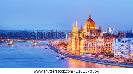 Budapest, Hungary. Night view on Parliament building over delta of Danube river. Royalty-Free Stock Photo #1181378566