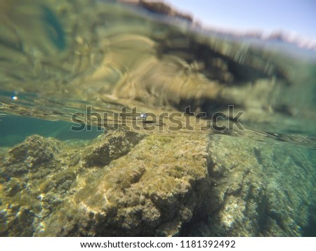Turquoise water in Minorca island Balearics Spain Underwater image Sa Mesquida coast