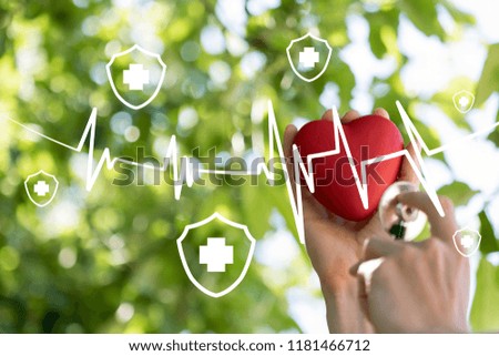 Doctor pushing button heart pulse healthcare security shield virus network on panel medicine health background.