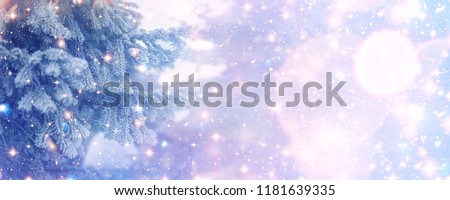 Christmas and New Year holidays background, greeting card.  Glitter lights backdrop. Winter season. Text space. Closeup of Christmas-tree. Elements of this Image Furnished by NASA.