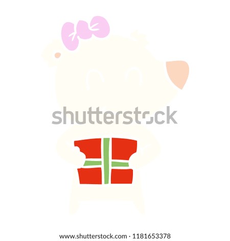 female polar bear with christmas present