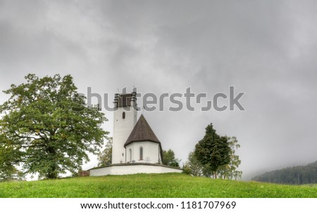 The church of St. Margarethen is located just above the city of Brannenburg in a magnificent landscape with a unique panoramic view over the Inn Valley. 