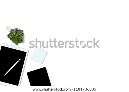 Flat lay photo of office table with laptop computer, digital tablet, mobile phone and accessories. on isolated white background. Desktop office mockup concept.