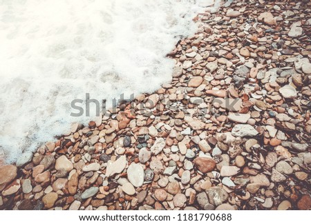 Pebbles brown texture. Rough structure mineral. Rock texture. Background of sea stone. Gravel texture. Ocean Pictures