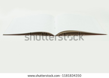 Note paper for musical notes. Blank music score book. Staff paper music.