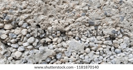 Concrete and pebbles background