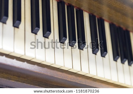 Vintage old piano. Close-up of keyboard keys