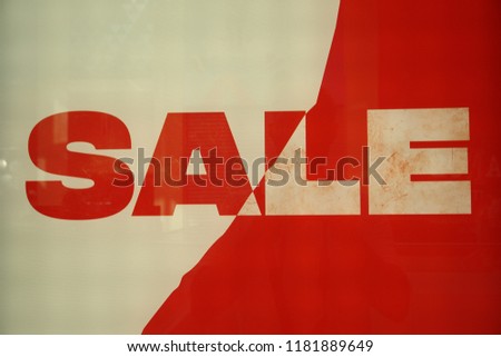 Banner with the inscription sale on a red and white background.