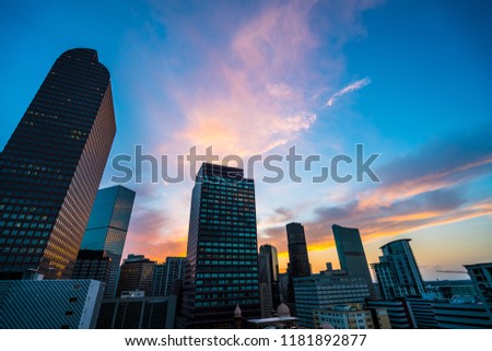 Pink and blue Perfect sunset in Denver , Colorado , USA - skyline cityscape downtown urban modern growth skyscrapers rise up into the Colorful Colorado pink and blue sky
