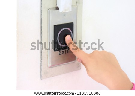 Child push the black exit button on electronic panel