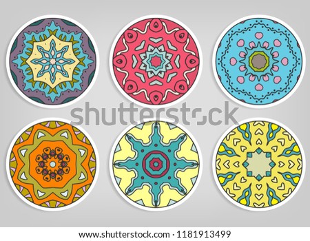 Decorative round ornaments set, isolated elements. Colorful mandala, stylized flower. Abstract geometric doodle patterns for plate decoration, fabric print,  business or greeting card design