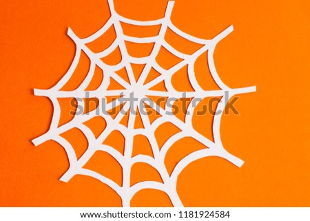  web of paper on orange  background