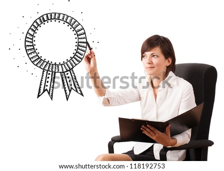 Young woman drawing a ribbon on whiteboard isolated on white