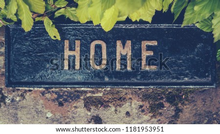 Retro Styled Image Of A Hidden Home Sign
