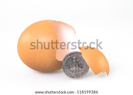 American coin from chicken egg, isolated on white
