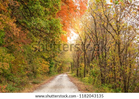 Beautiful view of a trail along the Missouri River bluffs in the fall Royalty-Free Stock Photo #1182043135
