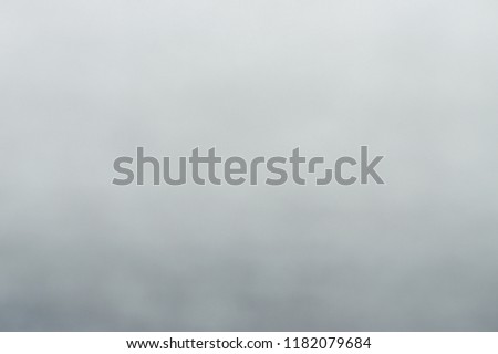 Blurry of gray abstract background same as cloud,fog,smoke.Beautiful seamless pattern for artwork design,website template and empty space for text.