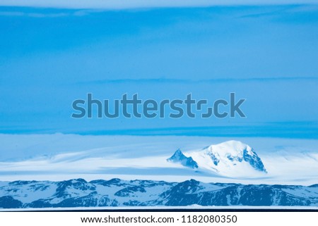 Majestic view of snow capped mountains in Antarctica