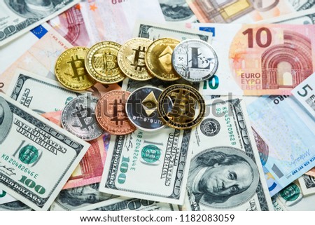 set of bitcoin, litcoin, ethereum - crypto currency on real money background. Internet security, risk, investment, business concept
