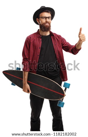 Hipster holding a longboard making a thumb up sign isolated on white background