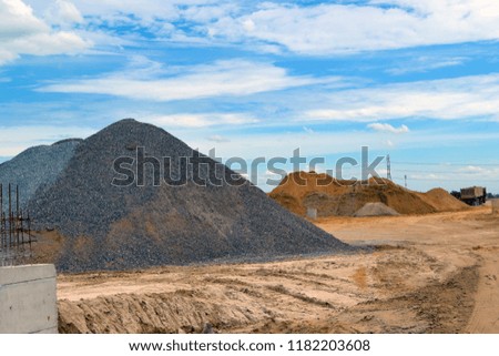 sand quarry in construction site with blue background.