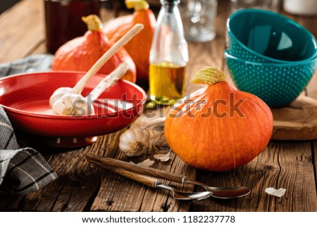 Ripe pumpkin, sliced pumpkin, pumpkin on the old board background 