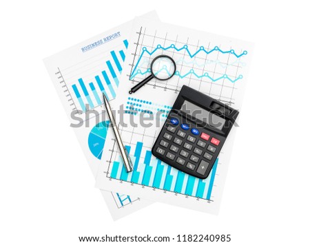Paper financial graphs and charts with calculator, magnifying glass and pen isolated on white. Royalty-Free Stock Photo #1182240985