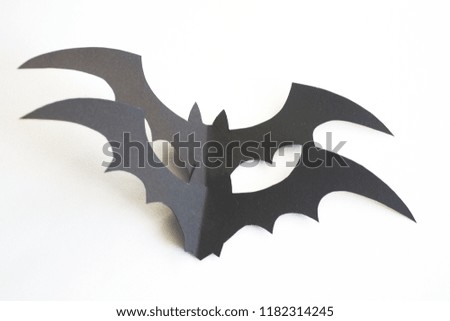 Black 3d paper bats for halloween isolated on white background