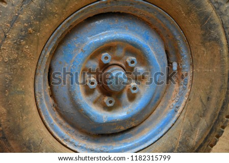 Close up of an old wheel belonging to a vintage car