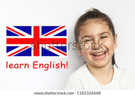 Learn English Language.  Education Concept. Happy child girl face.