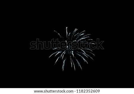 Festive fireworks in the night sky, colorful explosion against the dark night sky