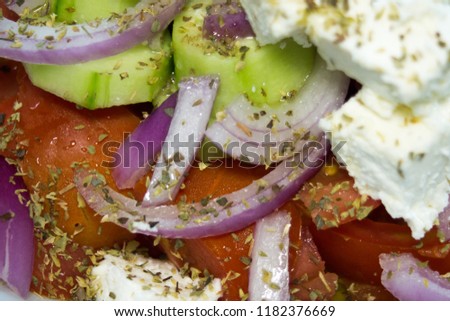 Traditional greek salad with fresh vegetables, feta cheese and olives