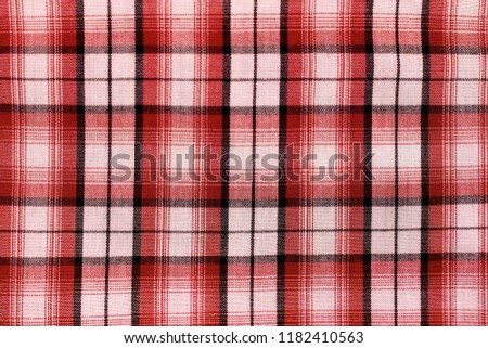 Scottish seamless table cloth background for holiday season. Christmas squared tartan fabric Christmas and New Year festive background for winter time. close up of red, black and white texture pattern