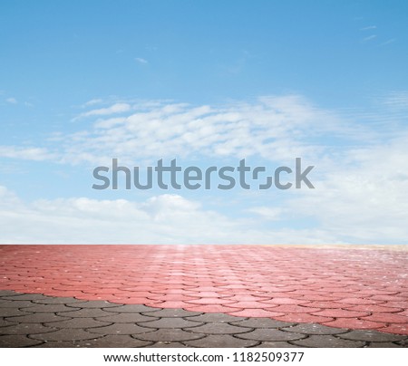 paving stones against the sky with clouds