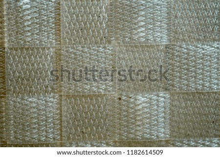White violet plastic weave creates a beautiful background.