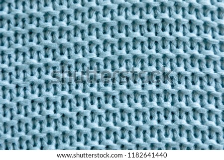 Handmade blue knitting wool texture background, knitted blanket
