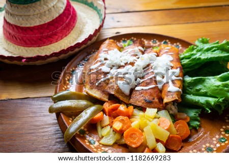 Traditional mexican enchiladas style "Queretanas"