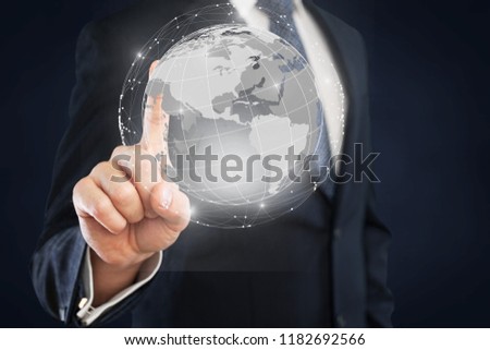 Businessman drawing earth on background